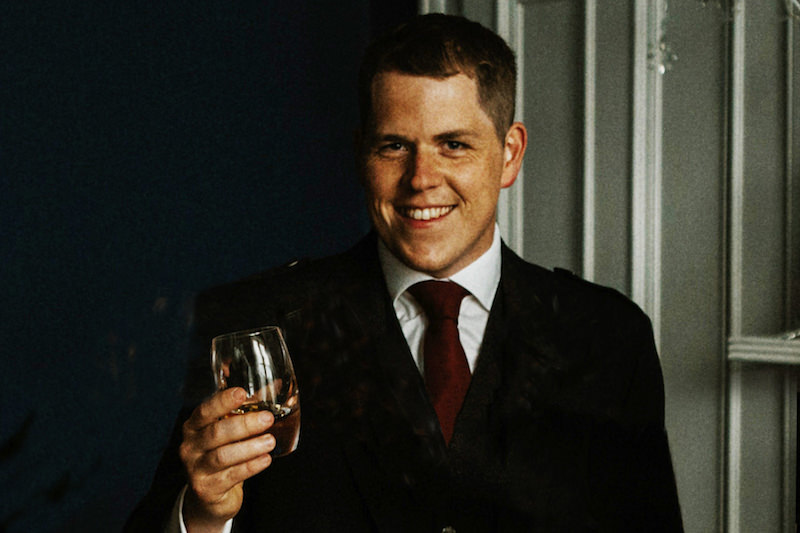Steve Vass with a Whisky and in a Kilt